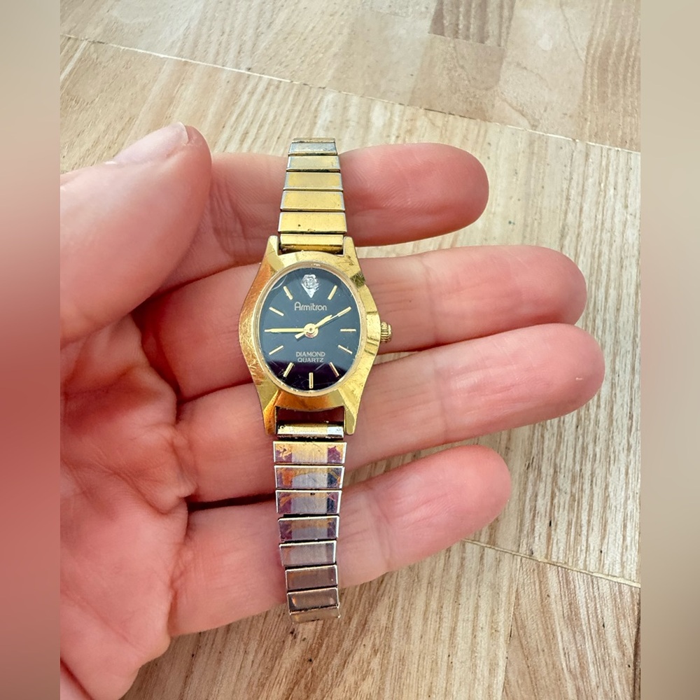 Vintage Armitron ladies diamond oval black dial gold tone watch NEW BATTERY
